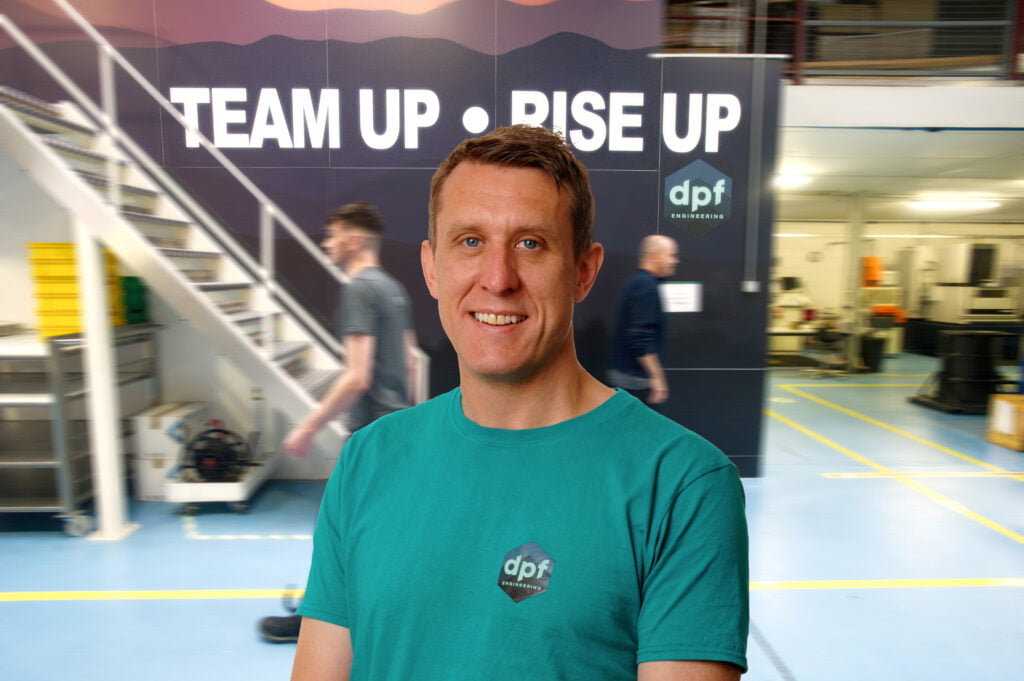 seamus in front of team up rise up poster